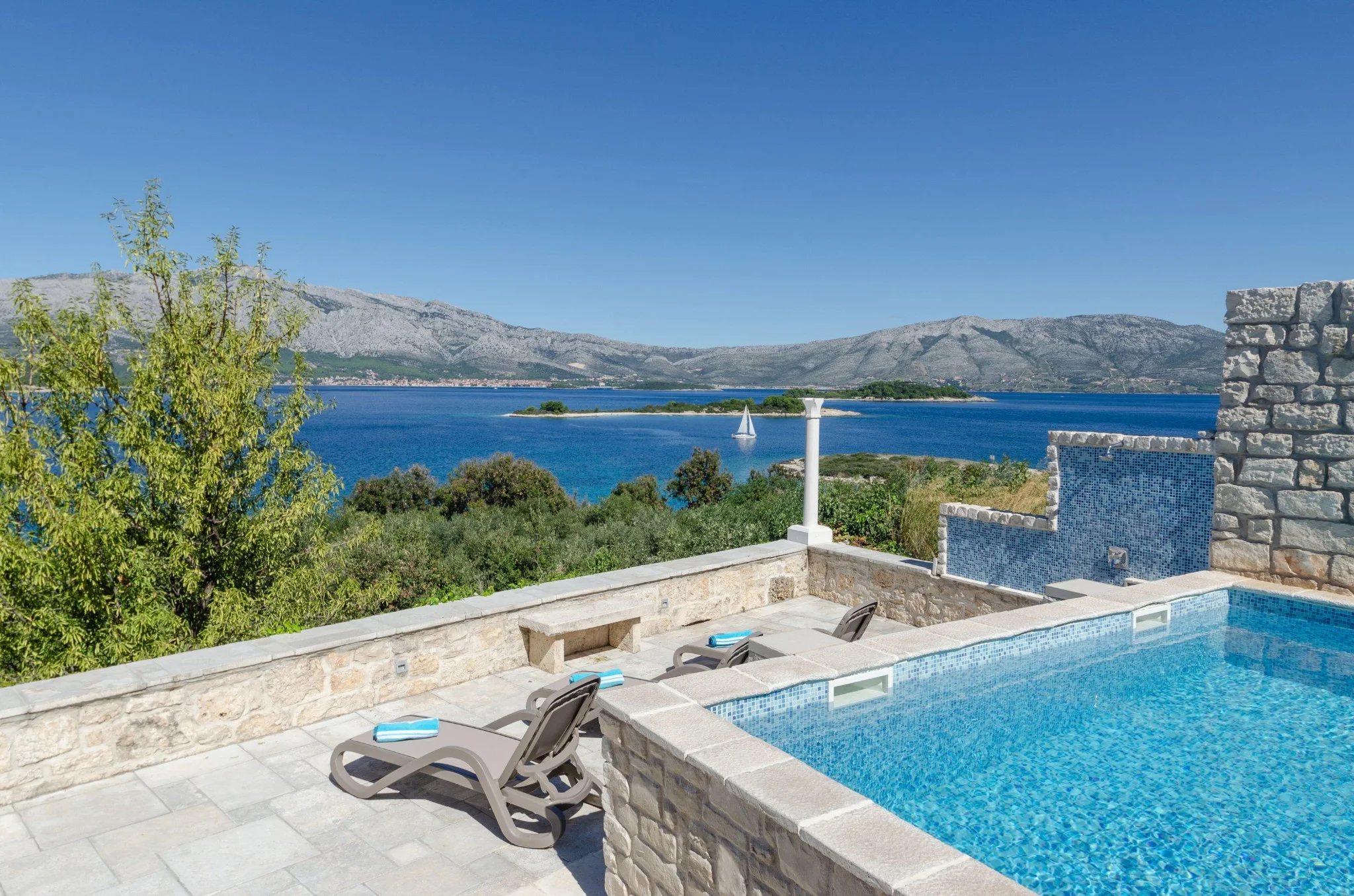 Private pool terrace at Villa Diamant overlooking the Adriatic Sea and mountains of Korčula